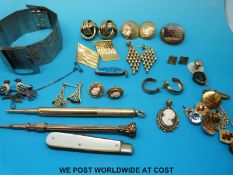 Seven pairs of 9ct gold earrings, two yellow metal pencils,