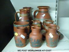A collection of terracotta Prattware including jugs