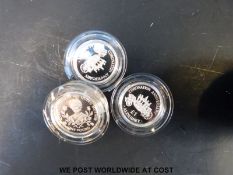 Three £1 silver Piedfort proof coins including Coronation,