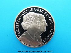 A £5 gold coin 2007 to commemorate The Queens Diamond Wedding Anniversary,