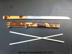 A Japanese tortoiseshell travelling set comprising knife and chopsticks,