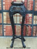 A Chinese padauk jardiniere stand with marble top (height 92cm)