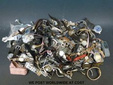 Over one-hundred various ladies and gentleman's wristwatches.