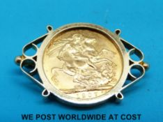 A 9ct gold brooch set with a 1907 gold full sovereign (11.