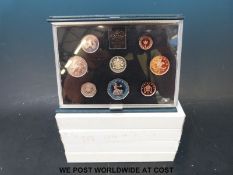 Four deluxe proof sets 1983, 87,