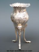 A Victorian hallmarked silver vase raised on three ram's head hoof footed legs, height 14.