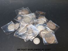 A collection of pre-1947 silver coins including crowns and half crowns etc
