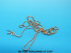 A yellow metal necklace, marked 14k (4.