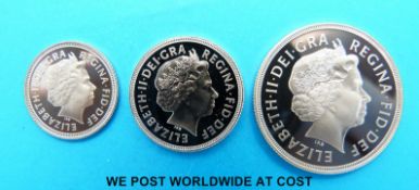 A cased set of UK gold proof coins comprising double sovereign, sovereign and half sovereign,