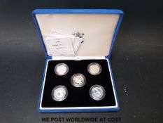 A set of five silver proof one pound coins,