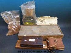 A set of clock golf garden numerals, a cased Sykes hydrometer with ivorine label to lid,