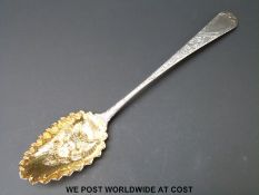 A Georgian hallmarked silver spoon with embossed mask to bowl, London 1795,