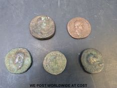 Five Roman bronze coins (largest 30mm) includes Nero and Hadrian