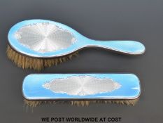 Two hallmarked silver and guilloché enamel dressing table brushes, both 1929, one Birmingham,