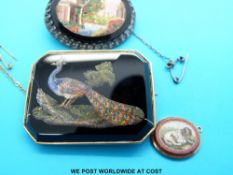 A micro mosaic brooch in the form of a peacock in yellow metal mount,
