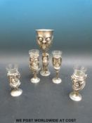 Four Lord of the Rings shot glass goblets to include Galadriel, an Orc,