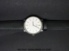 Omega DeVille gentleman's wristwatch with gold Omega symbol, baton markers,