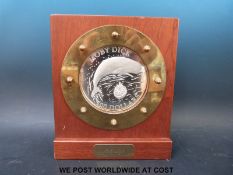 A Moby Dick 500 dollar silver Cook Islands Royal Dutch Mint 'Prooflike' coin mounted in a brass and