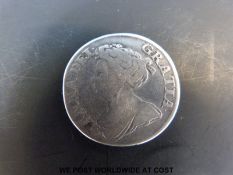 A Queen Anne 1711 4th bust shilling, plain in angles,