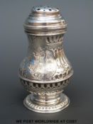 A Georgian hallmarked silver pepper, height 9cm, Britannia standard marks for London 1720,