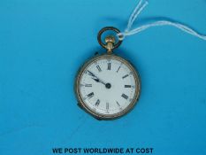 A ladies continental yellow metal fob watch with chased decoration to back, stamped 14k,