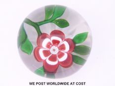 Baccarat primrose glass paperweight the central flower with red and white petals,