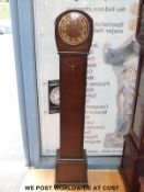 A c1930's oak cased granddaughter longcased clock with Smith's Enfield three train chiming movement,