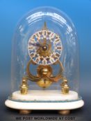 A 19thC brass skeleton clock under glass dome,