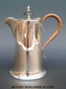 A Walker & Hall hallmarked silver hot water jug, height 16cm,