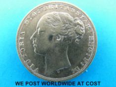 An 1876 young head gold full sovereign