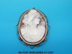 A yellow metal brooch, marked 9ct,