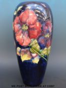 A large Moorcroft lamp base in Anemone pattern (31.