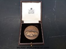A pig breeding medal presented to Mr A.C. Lawrence 1966-1969 by BOCM in Garrard & Co.