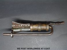 A 19th century Nepalese temple lock and key,