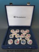 A cased collection of enamelled 22ct gold plated picture coins featuring William and Kate wedding