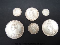 A group of six Victorian silver coins to include Jubilee crown, double florin, florin,