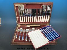 A cased set of six hallmarked silver handled knives and a canteen of silver plated cutlery