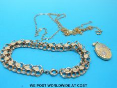A 9ct gold necklace, a yellow metal bracelet with loop and heart design marked 9ct,