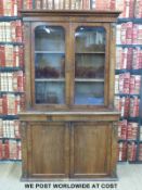 A continental gilt metal mounted and inlaid bookcase with glazed top section (width 119cm,