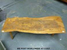 A carved elm or similar bench (length 135cm)