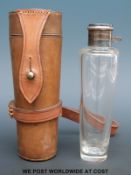 A leather-cased conical hunting flask with plated bayonet cap,