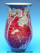 A Crown Devon lustre vase decorated with flowers,