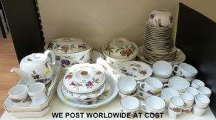 A large collection of Royal Worcester Evesham Gold dinner and tea ware to include lasagne and