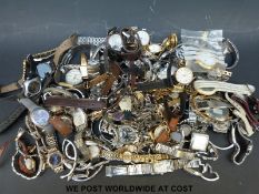 Over one-hundred various ladies and gentleman's wristwatches.