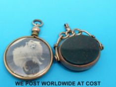 A 9ct gold swivel fob and a portrait fob