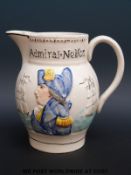 A relief moulded Admiral Nelson Captain Hardy jug (15cm tall)
