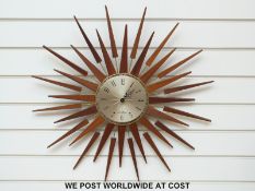 A retro Seth Thomas sunburst clock