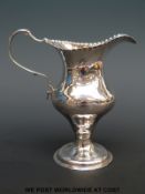 A Hester Bateman hallmarked Georgian silver cream jug, London 1782, height 11.