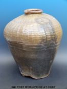 A large antique Egyptian wine pot (45cm tall,