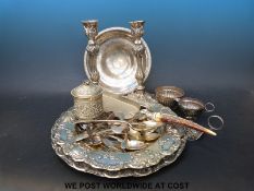 A collection of silver plate including a pair of candlesticks,